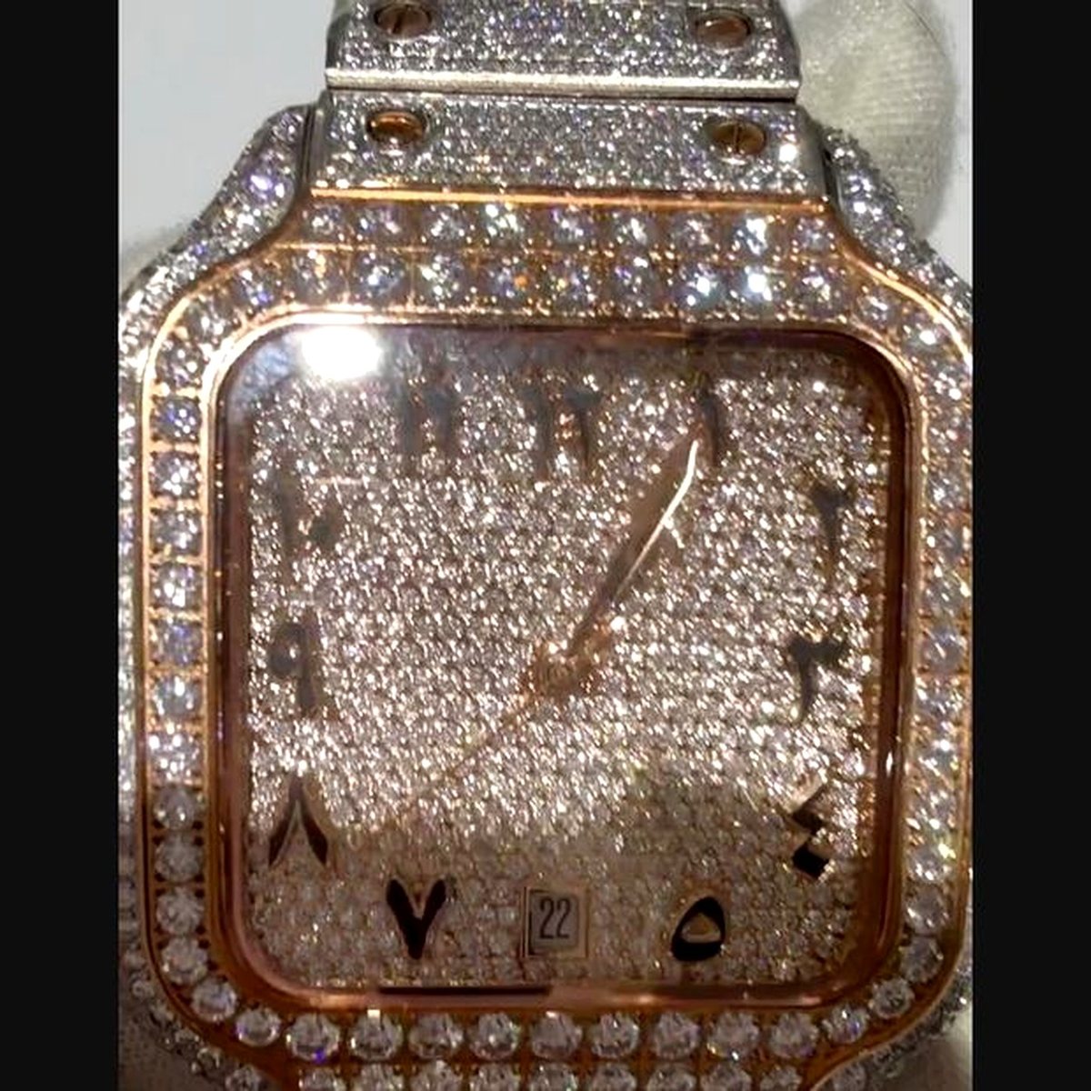 Pave dial with Arabic numerals, two-tone rose case